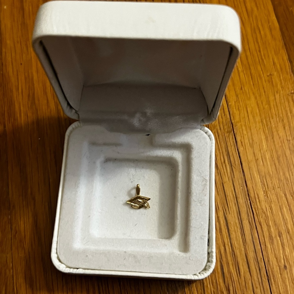 14K Yellow Gold Graduation Charm. 
Will Include box and Gift Wrap!